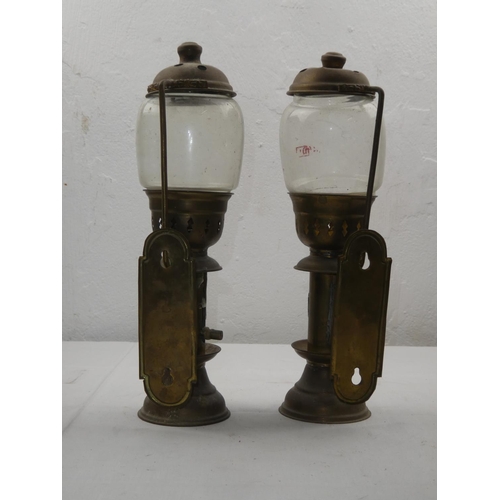 426 - A pair of brass 'GWR' candleholders.