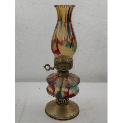 431 - A coloured glass oil lamp.