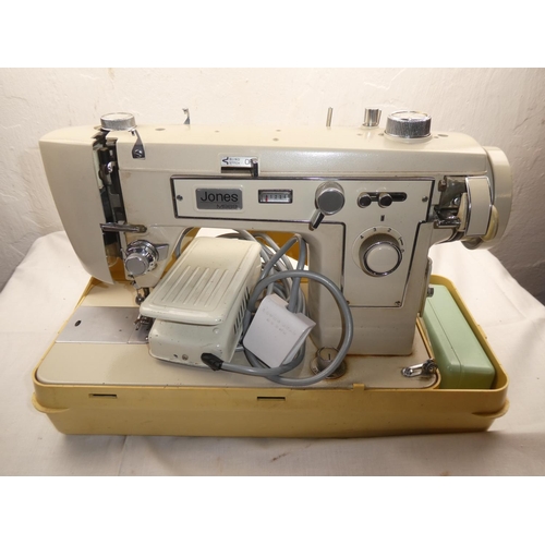 453 - A vintage cased sewing machine.