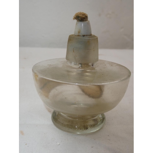 476 - A miniature oil lamp.