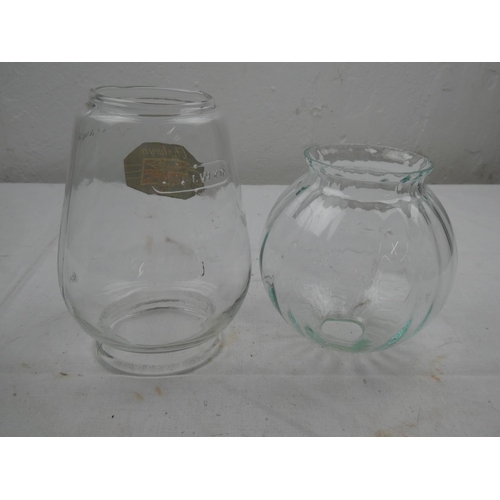 479 - A vintage glass oil lamp shade and another.