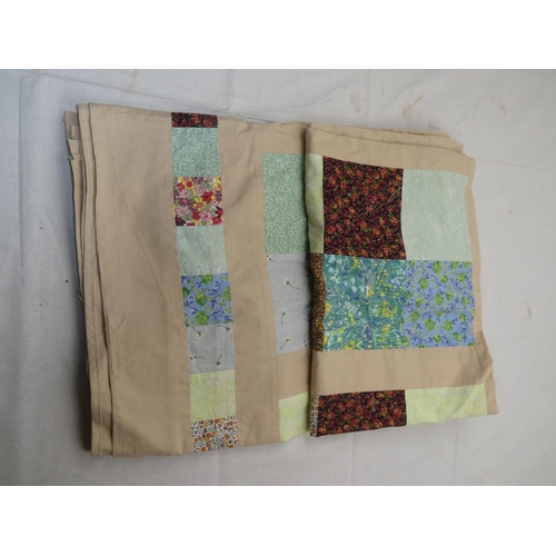 495 - A large vintage patchwork quilt, top and cover worked in a pattern of squares.