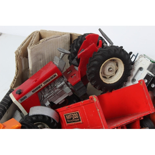 501 - A large lot of vintage Britians diecast farm vehicles and more.