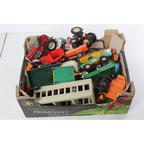 501 - A large lot of vintage Britians diecast farm vehicles and more.