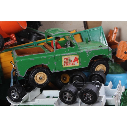 501 - A large lot of vintage Britians diecast farm vehicles and more.