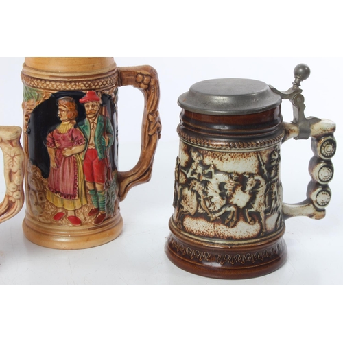 512 - A collection of German tankards.