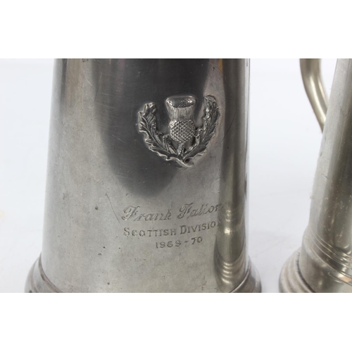 518 - Two pewter tankards.