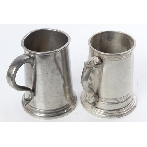 518 - Two pewter tankards.