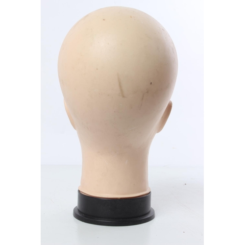 526 - A vintage shop mannequin head.