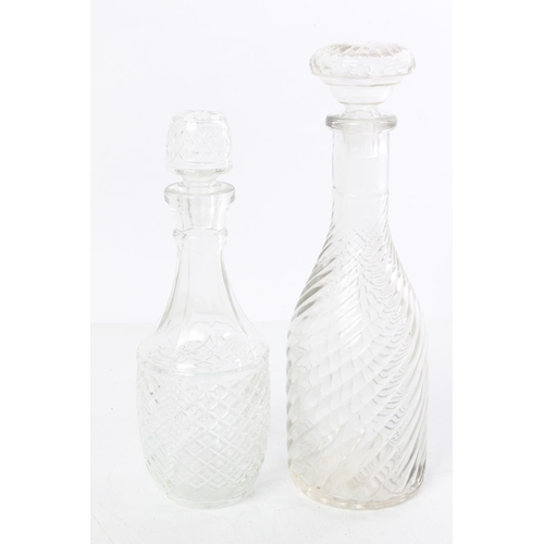 539 - Two glass decanters.