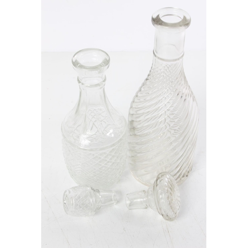 539 - Two glass decanters.