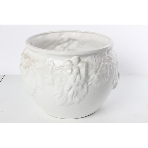 566 - A white glazed ceramic plant pot.