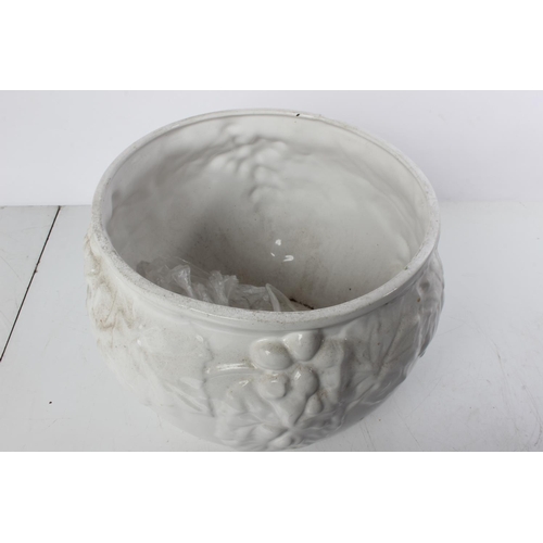 566 - A white glazed ceramic plant pot.