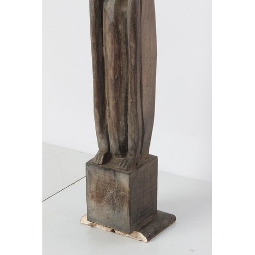 567 - A tall wooden African style figure.