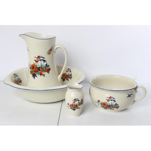 213 - A vintage Empire Ware 'Merry Glaze' jug and basin set, chamber pot and tooth brush holder.