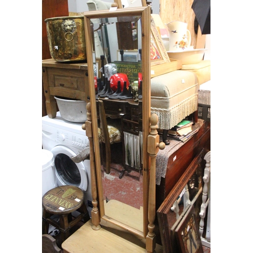 228 - A pine cheval dressing mirror.