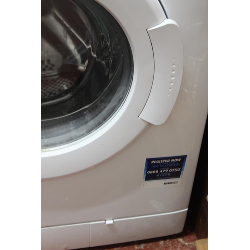 231 - A Beko washing machine.