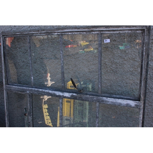 34 - A set of antique architectural salvage industrial windows, measuring approximately 49