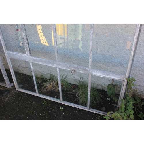 34 - A set of antique architectural salvage industrial windows, measuring approximately 49