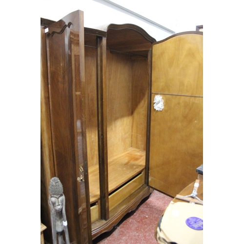 351 - A stunning large antique mahogany two door wardrobe with mirror panel.