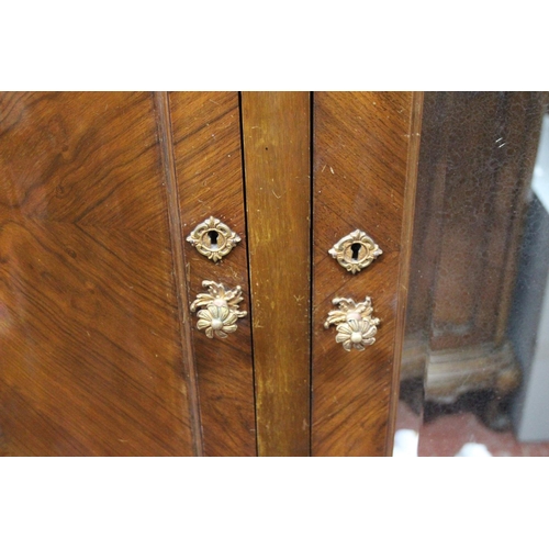 351 - A stunning large antique mahogany two door wardrobe with mirror panel.