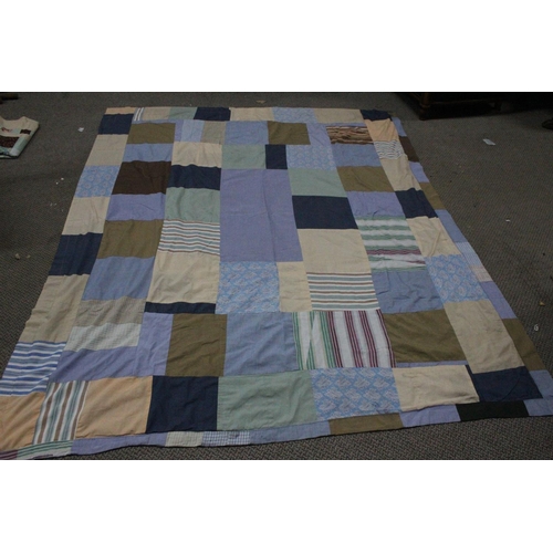 494 - A vintage large double sided patchwork quilt.