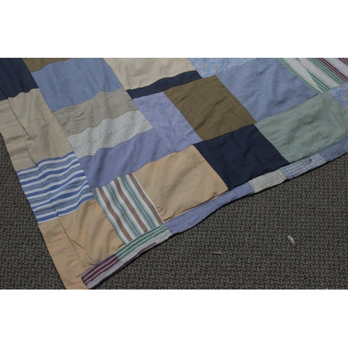 494 - A vintage large double sided patchwork quilt.