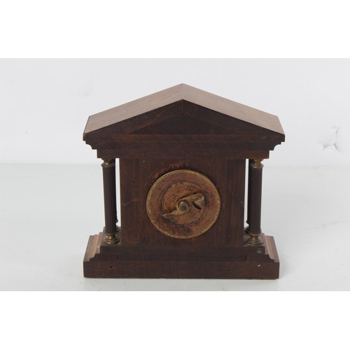 515 - A stunning miniature clock with ceramic face.