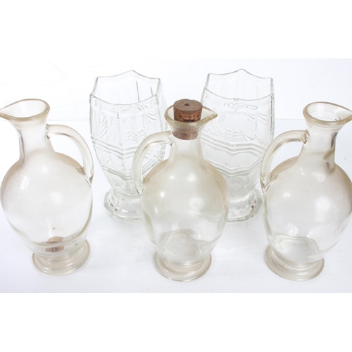 362 - Three vintage pressed glass jugs and two vases.