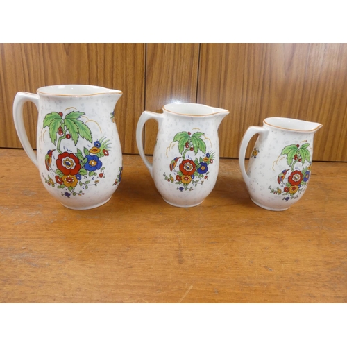 442 - A stunning trio of Crown Ducal jugs.