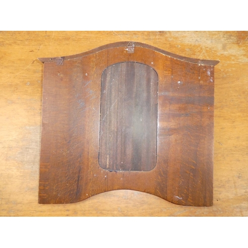 460 - A mahogany mirror backed wall mount with four hooks.