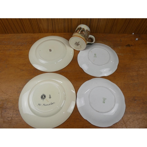 496 - An assortment of antique cabinet plates to include a Royal Doulton mug and plate 'Mr Micawber' and m... 