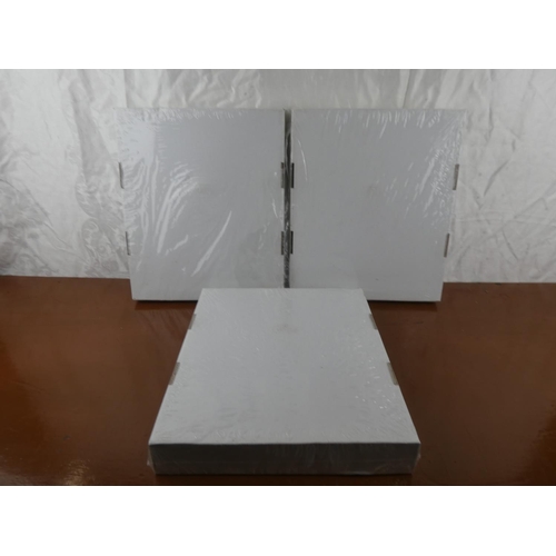 Three Hannah Montana wall clocks.