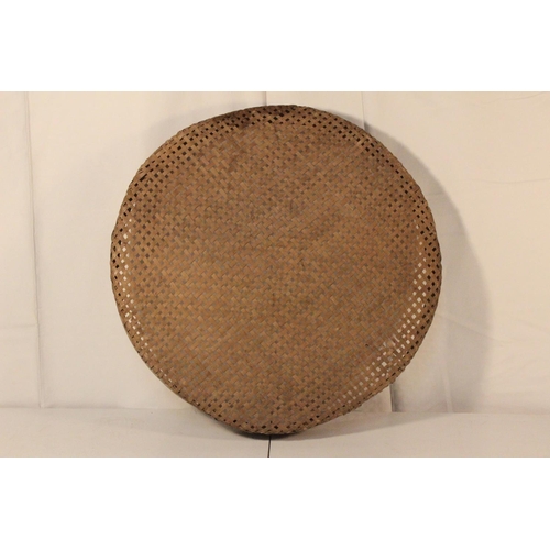 5 - A large antique wooden and rattan garden riddle, measuring 57cm wide.