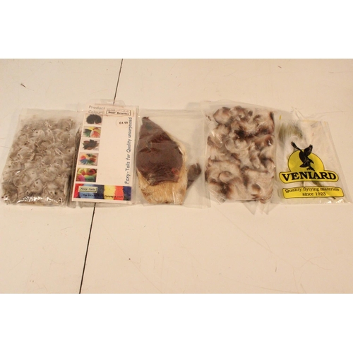 51 - A lot of assorted packs of fly tying materials.
