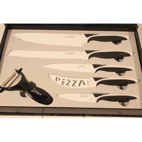 74 - A boxed Kitchen Line 6 piece knife set.