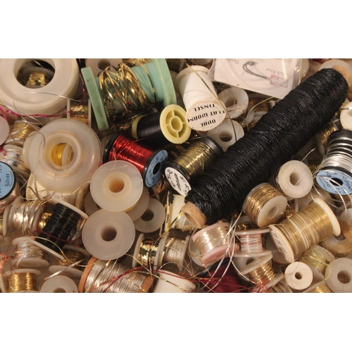 84 - A large assortment of fly tying tinsels.