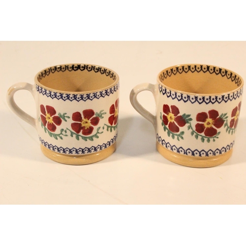 98 - Two Nicholas Mosse pottery cups.