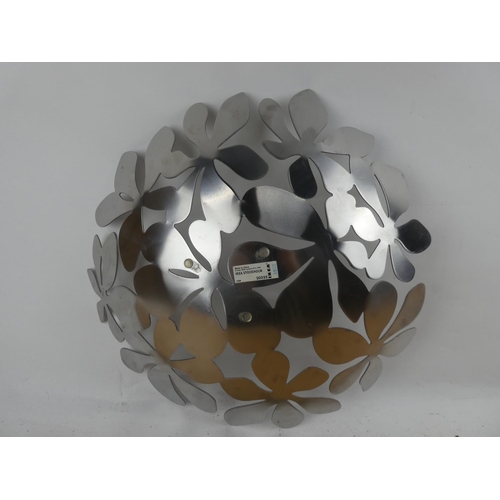 117 - A metal floral patterned fruit bowl