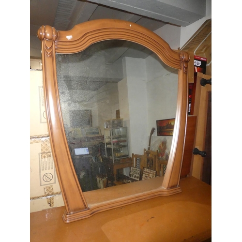 135 - A large ornate framed mirror.