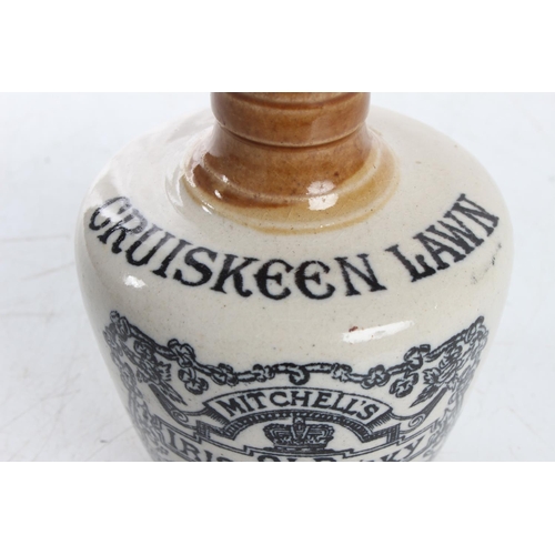 100 - An unusual small antique stoneware whisky crock, 'Mitchells Old Irish Whisky - Belfast'.