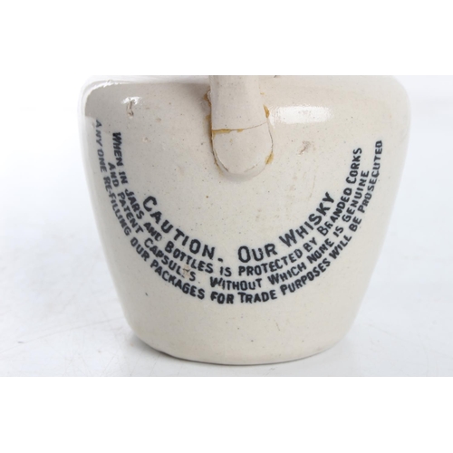 100 - An unusual small antique stoneware whisky crock, 'Mitchells Old Irish Whisky - Belfast'.