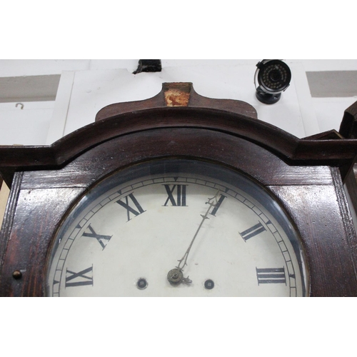 59 - An antique pine cased Grandfather clock with painted dial, in need of restoration.