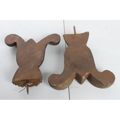 69 - A pair of decorative wooden finials.