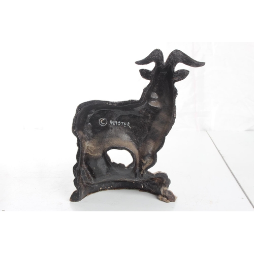 75 - A cast iron goat doorstop.