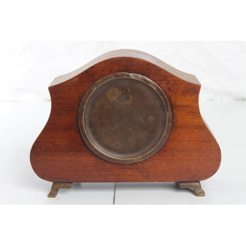 88 - An antique mantle clock with inlaid wooden case.