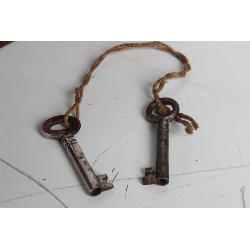 96 - An antique walnut box with original key.