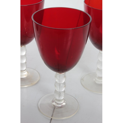 102 - A set of 4 vintage cranberry glasses.