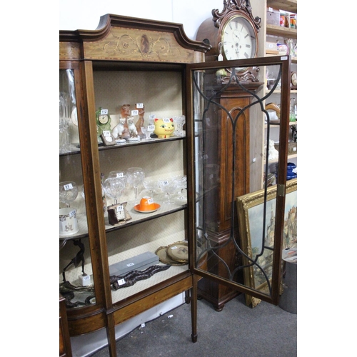 106 - A stunning antique/ Edwardian inlaid display cabinet on spade feet. Measures 110x180x40cm.