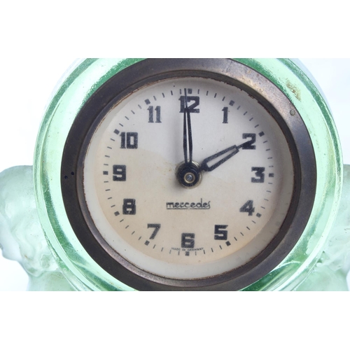 112 - A stunning antique/ Art Deco Mercedes mantle clock in decorative Uranium Glass case, measuring 7